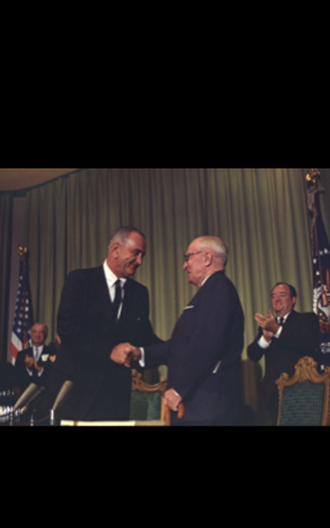 LBJ with President Truman at the signing of the Medicare Act, 1965